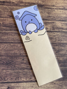 Marque page d’un adorable calamar style kawaï